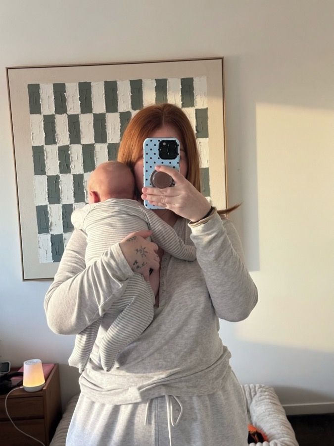 Mirror selfie cuddling Hudson at home
