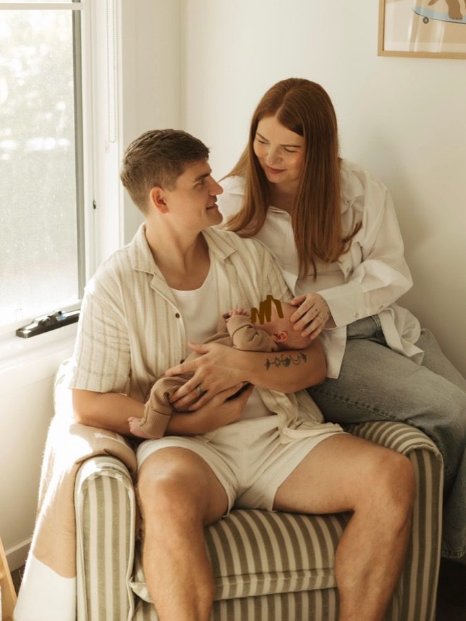 Newborn photos at home in the armchair